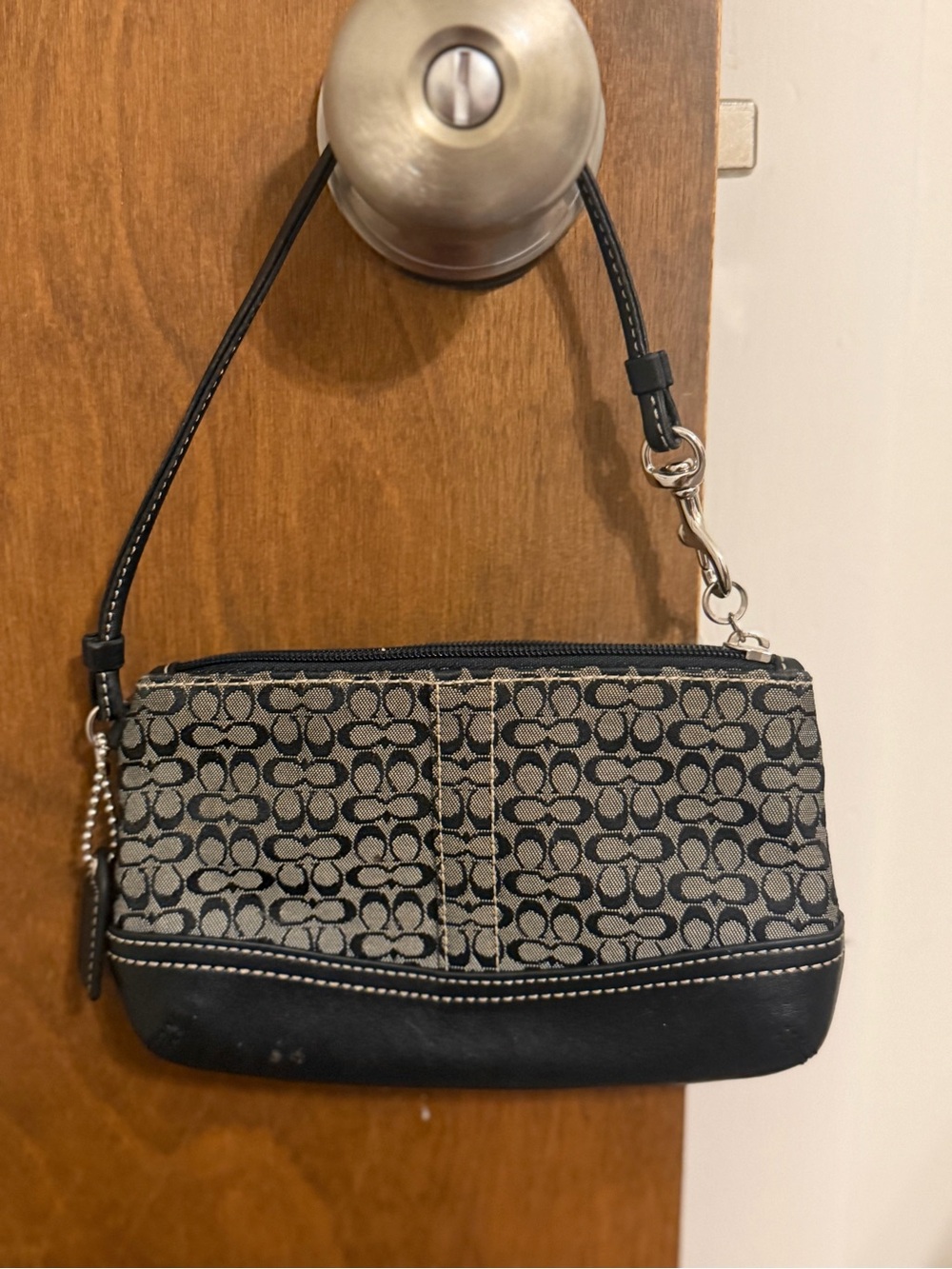 Coach Signature Canvas Wristlet in Black and Tan